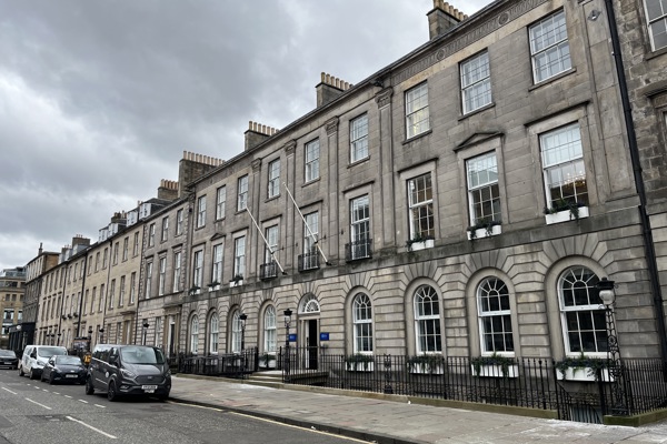 Exterior view of Henry Duncan House, a B‑listed Georgian office building on George Street, Edinburgh, with stone façades, sash windows and the street in the foreground.